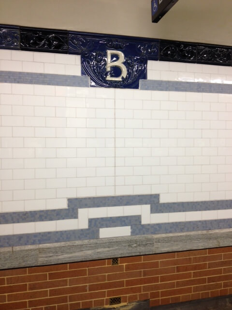 Doing it right, the newly renovated Bleecker Street Station preserved historic materials and combined them with reproduction tiles to reclaim a historic IRT station that had been blah'd by an earlier 1950s renovation.