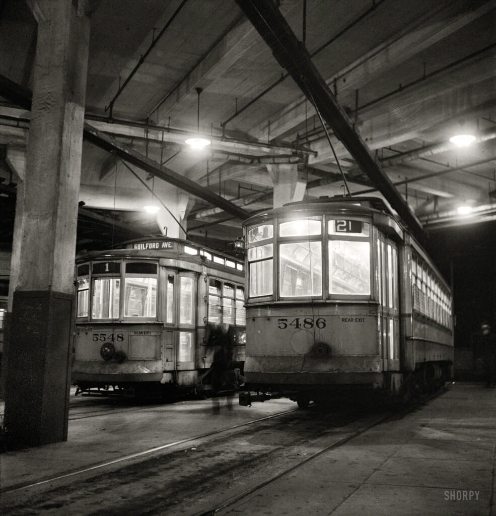 April 1943. “Baltimore, Maryland. Trolleys inside the Park Terminal at night.” Photo by Marjory Collins for the Office of War Information.